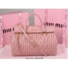 Кожена чанта с цип Miu Miu Glazed Matelasse в розово